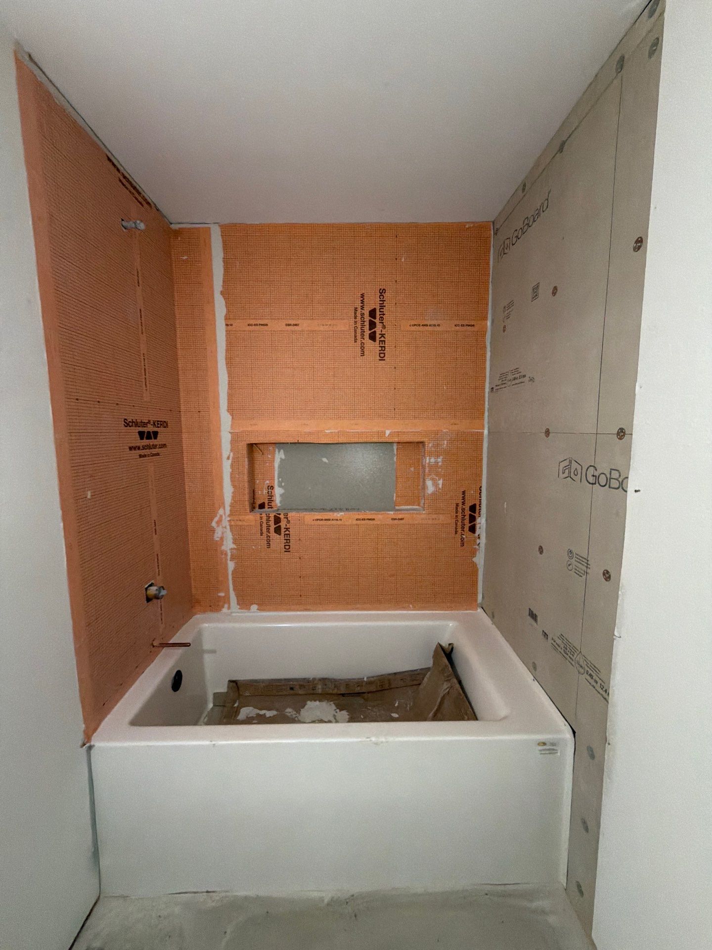 Schluter Kerdi waterproofed tub surround ready for tile