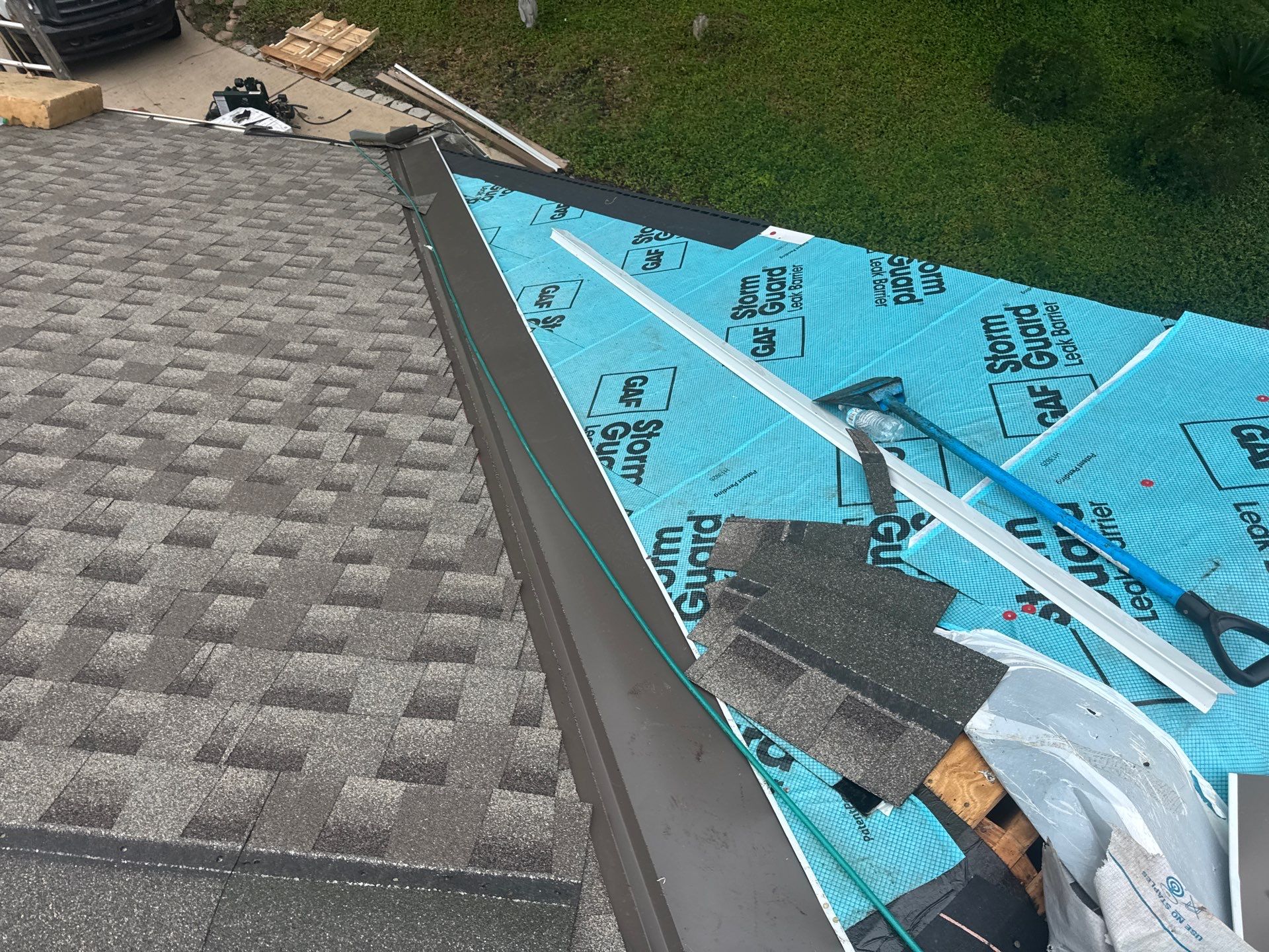 GAF StormGuard leak barrier installed in roof valley with drip edge and starter course
