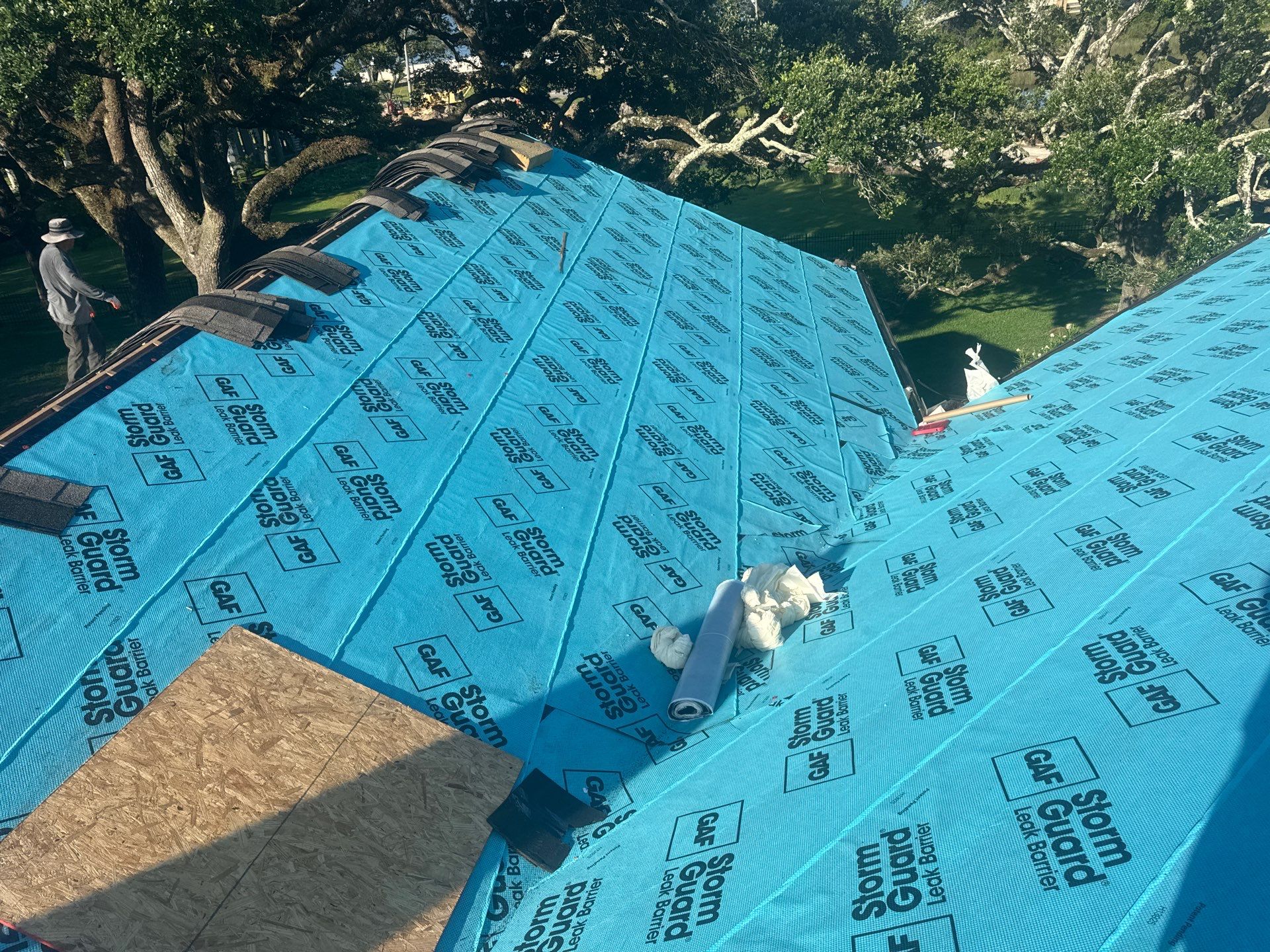 Full GAF StormGuard leak barrier underlayment with starter course going on